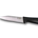 Cuchillo pelador a granel de acero inoxidable Cuchillería Navarro con mango ergonómico negro.